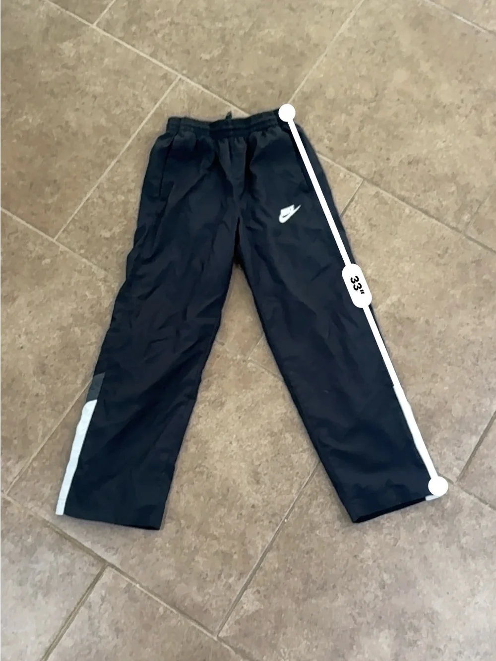 Nike Black Joggers with White Logo and Side Accents